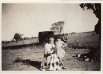 photograph of the writer, the writer's mother, a truck and the outback in the 1950's